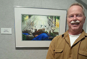 Photo of the artist next to Guardians